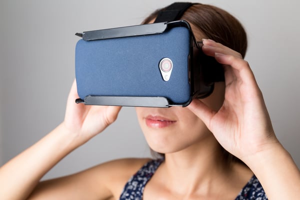 Woman using the VR for watching film